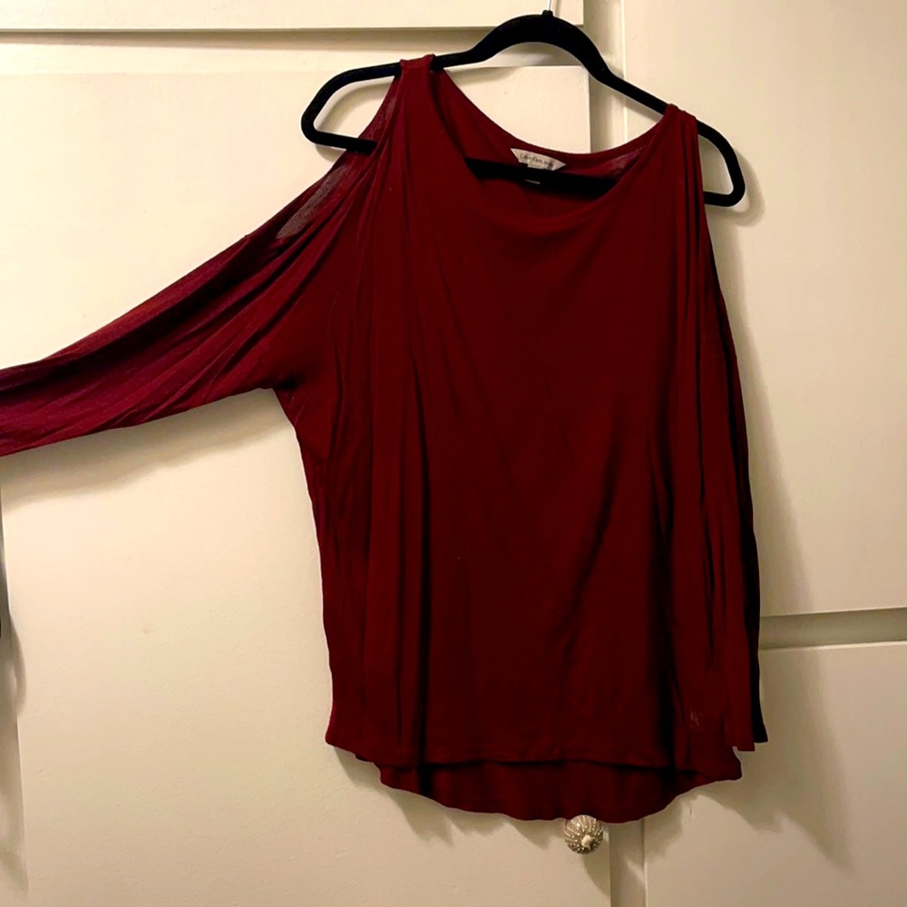 Burgundy open shoulder top.